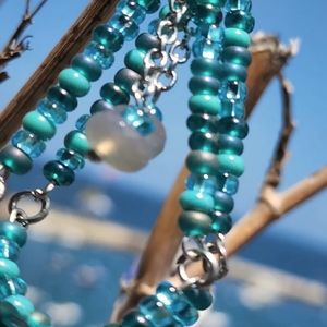 Handmade tear drop earring with blue qurts and glass beads